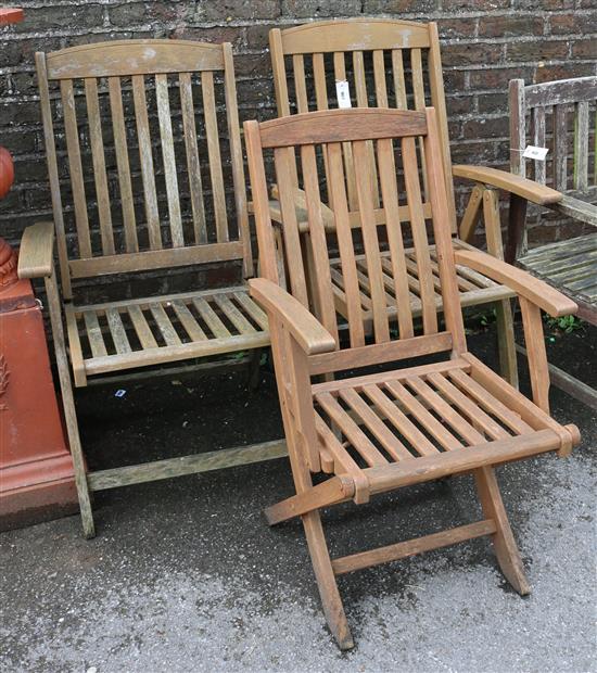 Pair teak carvers & another(-)